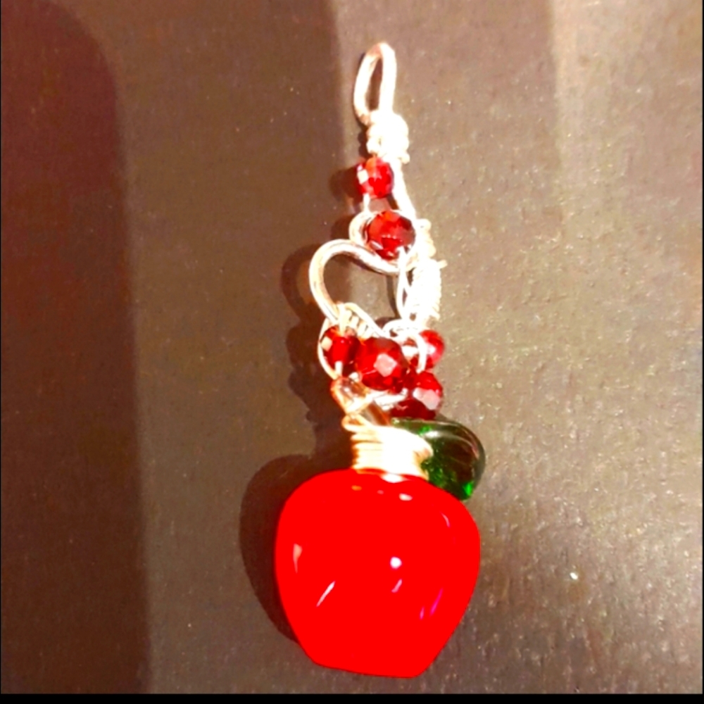 Glas Apple Sterling Silver Wire Wrapped With Garnets.